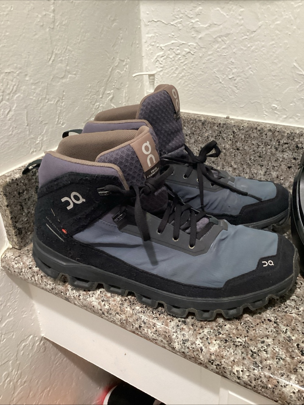 On Running Mid-Top Hiking Boots in Slate Blue and Black with Tan Accents